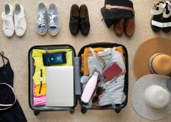 Packed suitcase for digital nomad travel
