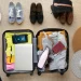 Packed suitcase for digital nomad travel