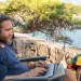 Digital nomad leveraging travel technology for seamless remote work.